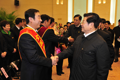 Politburo Member Mr.Wang Zhaoguo gave an interview to National Model Worker Mr. Xu Xiufeng in January of 2012